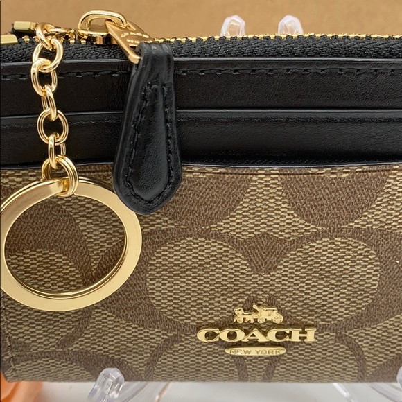 Mini Skinny Id Case In Signature Canvas - Picture 12 of 16